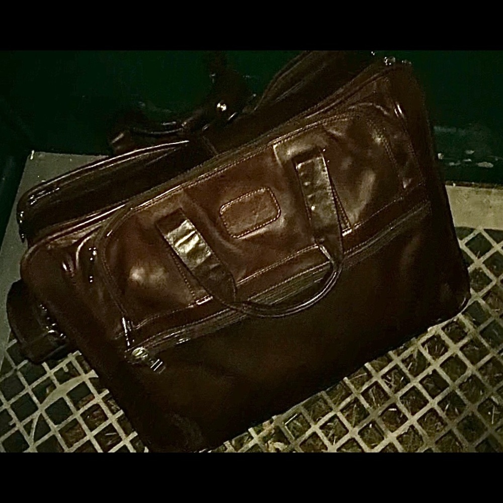 TUMI large dark brown over the shoulder briefcase